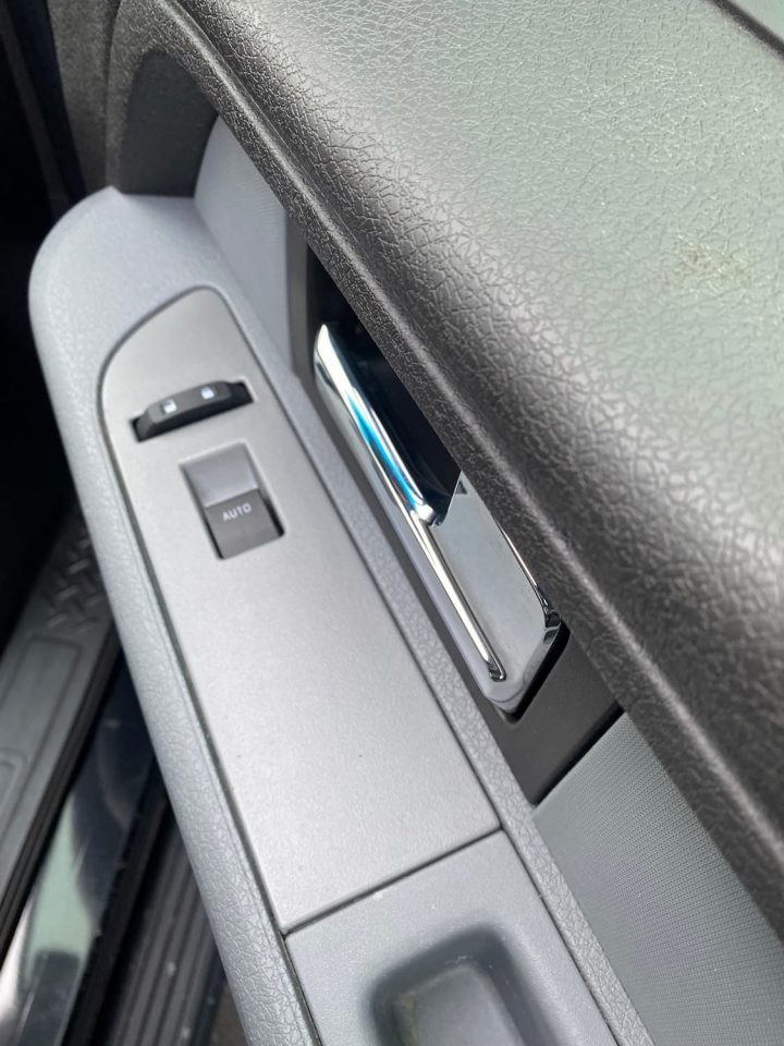 After photo of a door panel that has been repaired by New Life Vinyl Repair.
