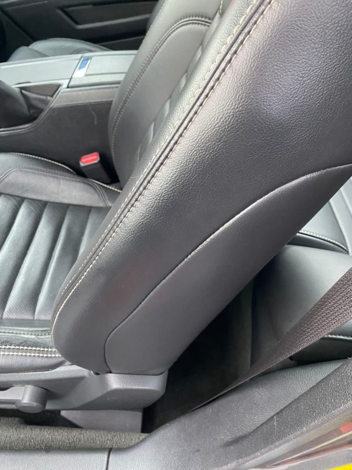 After photo of the side of a car seat that has been repaired.